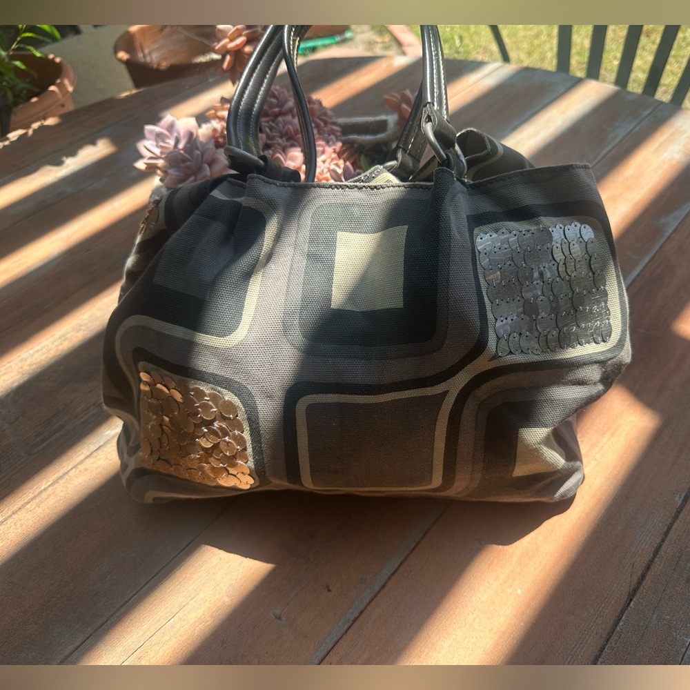 Maliparmi Bag. Used. Fabric and reflected decoration stone